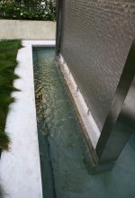 The looks and sounds of the M13Z-247 wire mesh waterfall are unique both day and night.